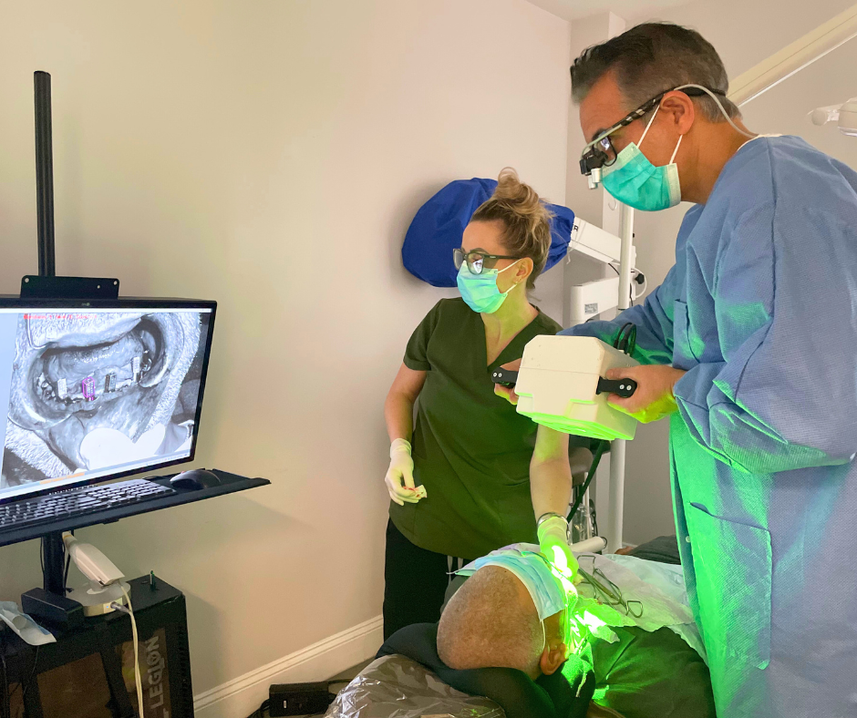Dr Richard Nejat of Advanced Periodontics & Implant Dentistry Bronxville with a patient